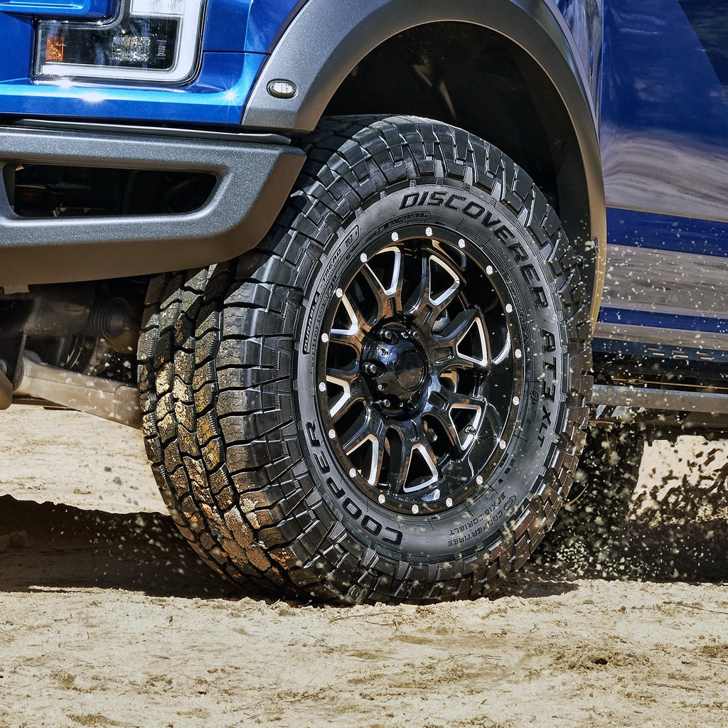 Cooper Discoverer AT3 XLT All Terrain Tires 285/75R16 10 Ply E &ndash; Fits Light Trucks &amp; Hummer H3 Models